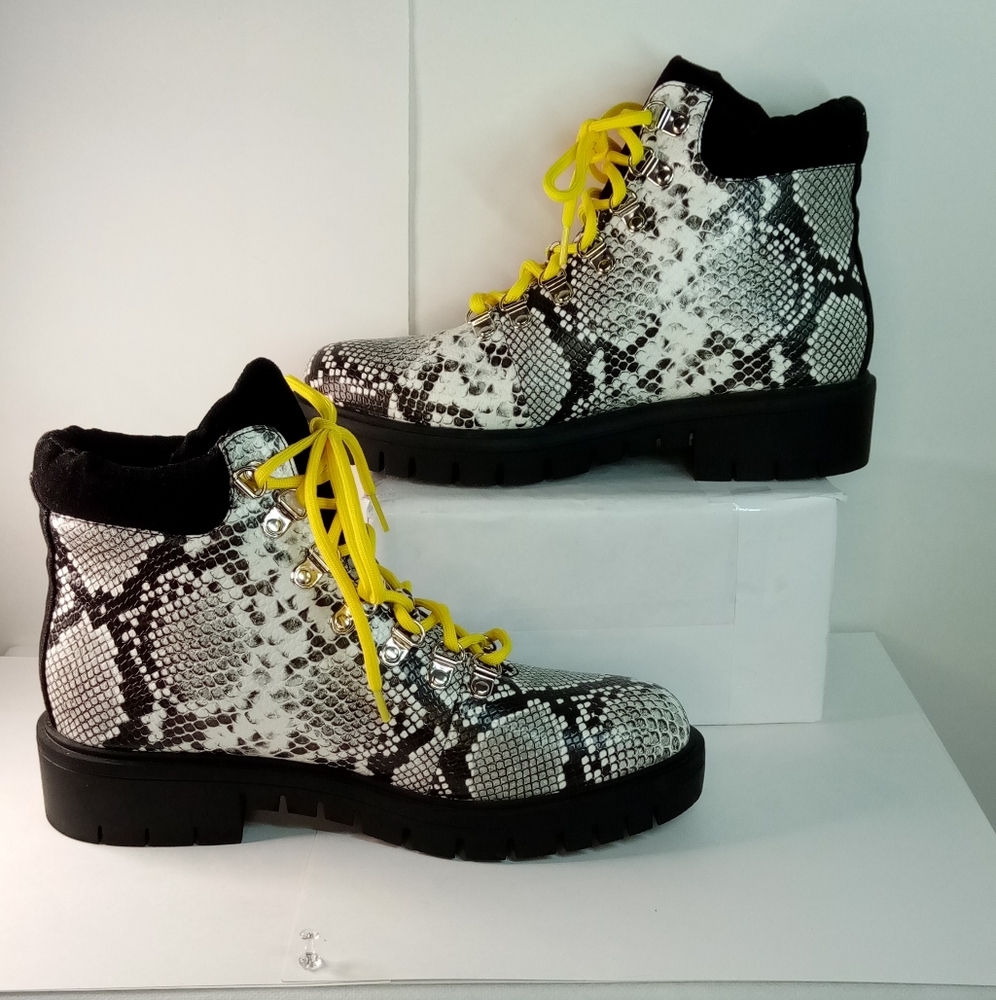 Cape Robbin snakeskin ankle combat boots.